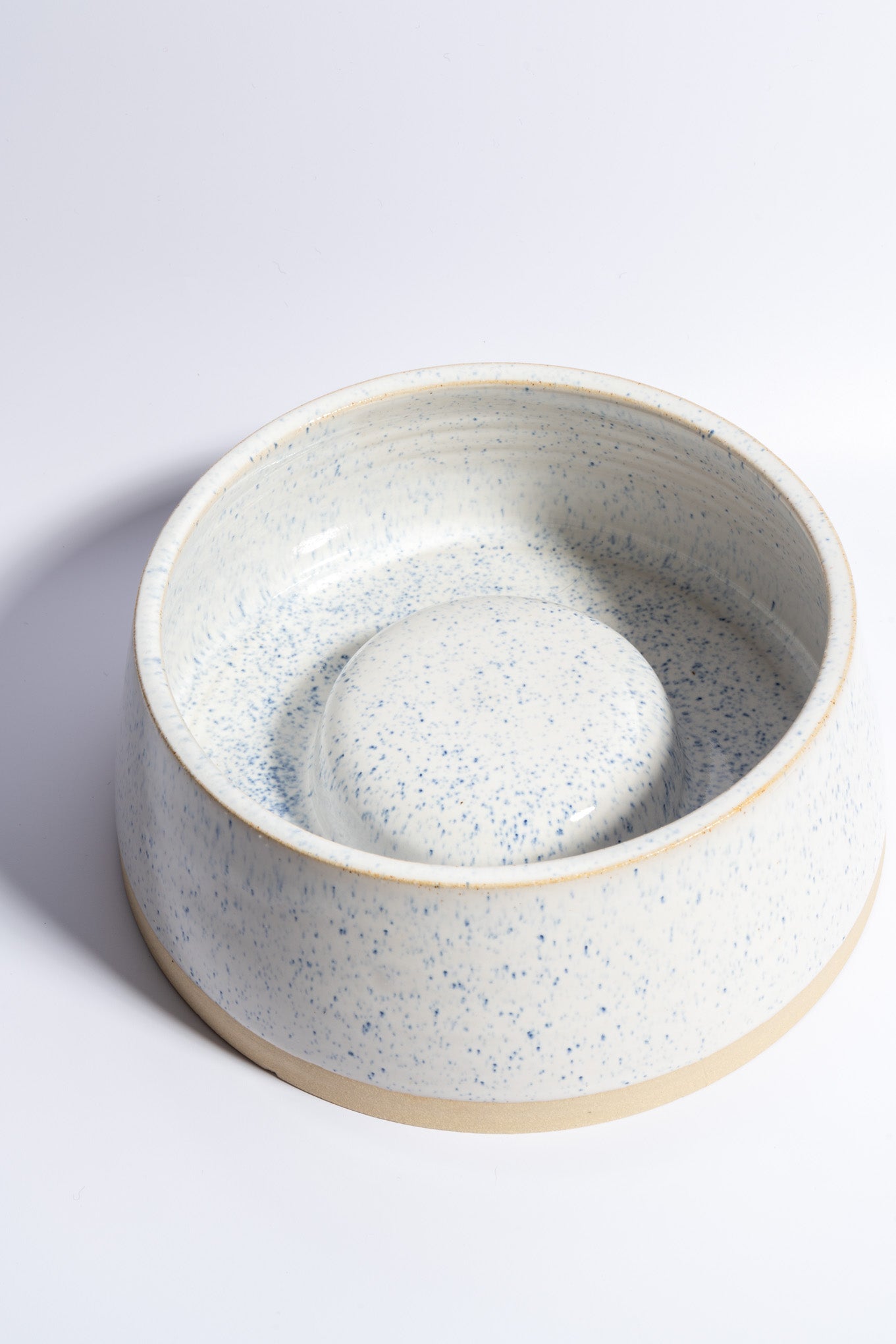 Hand thrown slow feeder in speckled blue