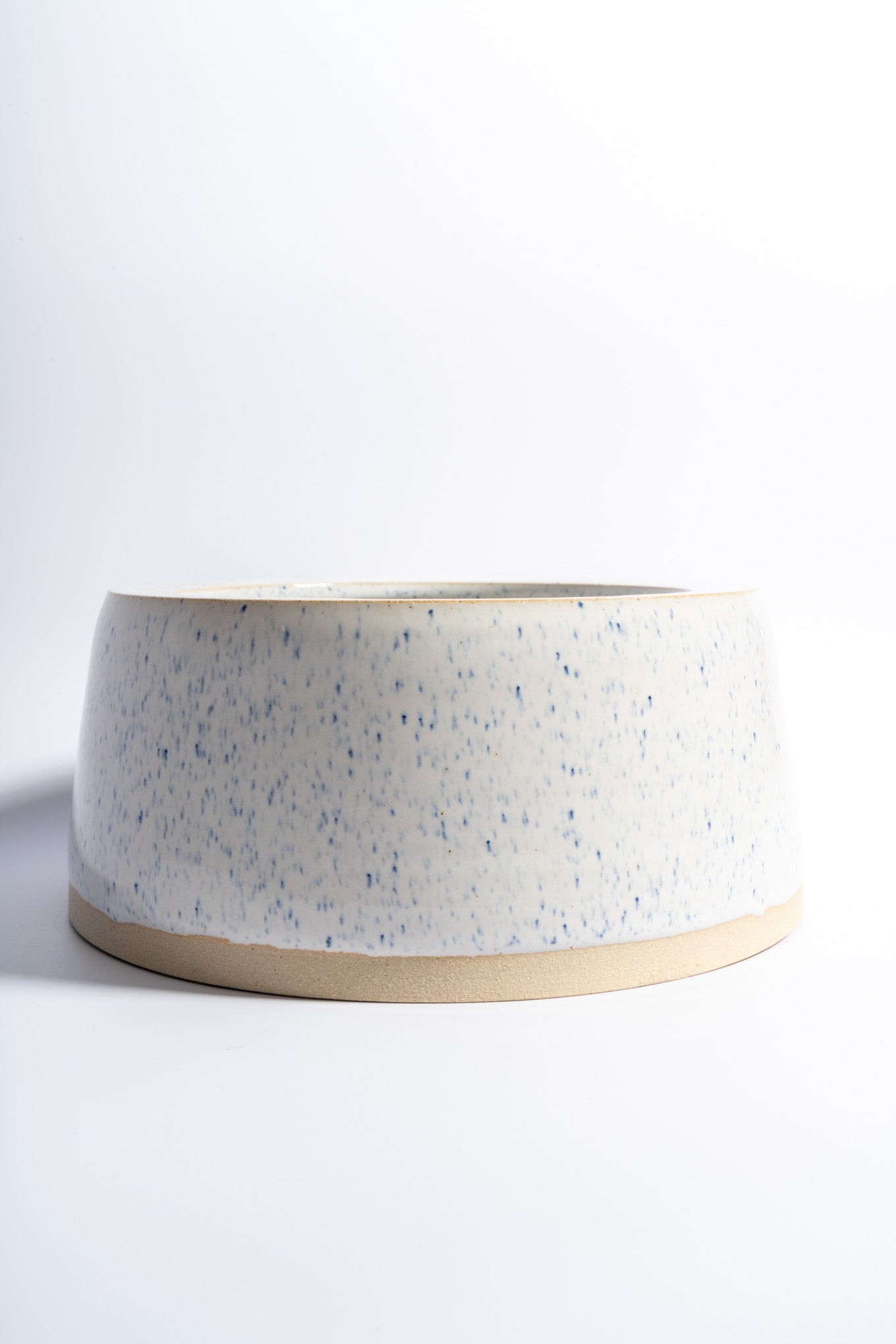 Hand thrown slow feeder in speckled blue