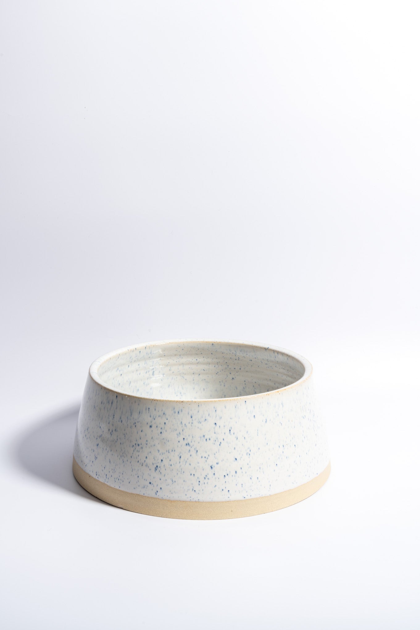 Hand thrown slow feeder in speckled blue